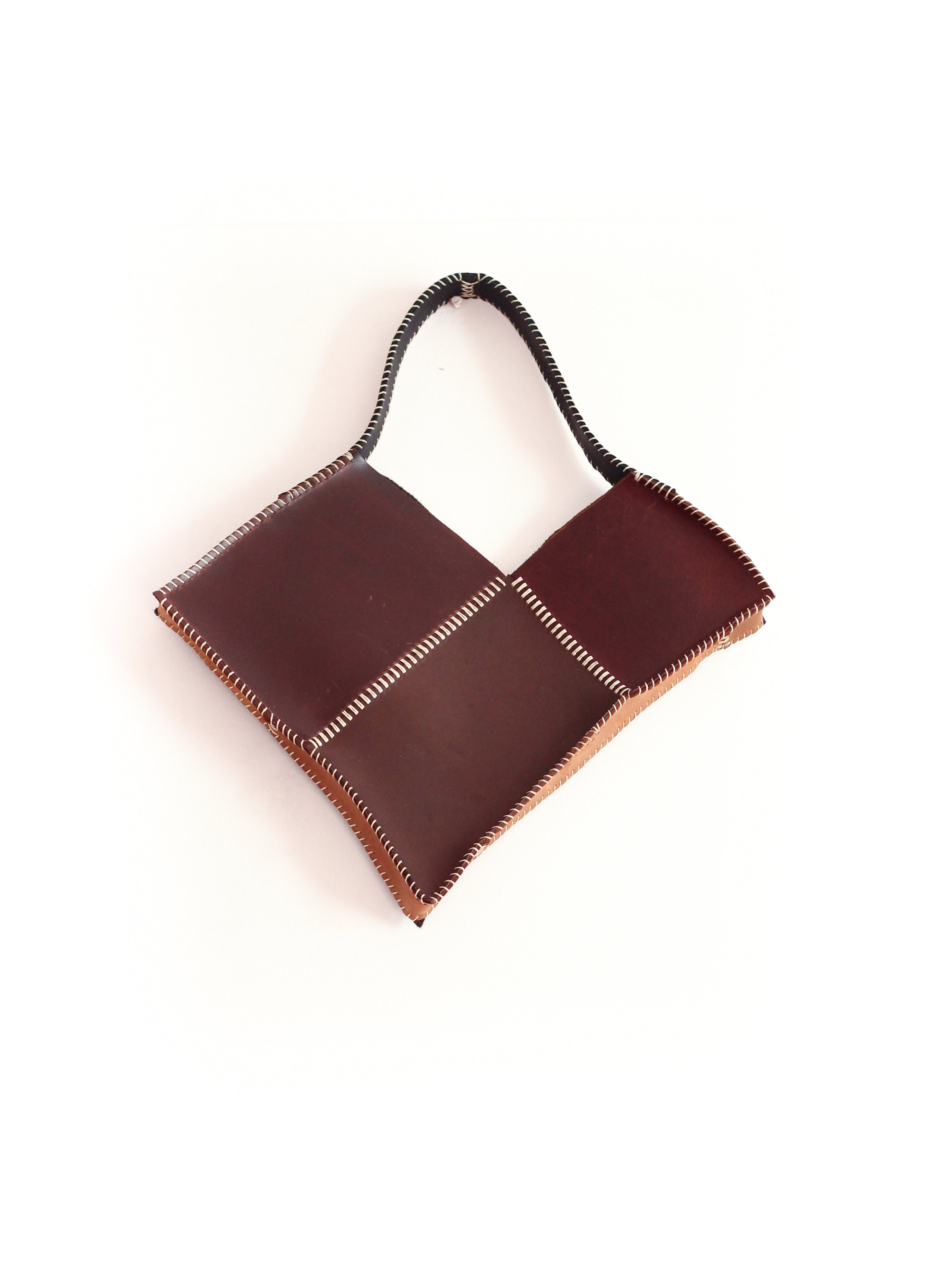 the brown broken heart leather bag