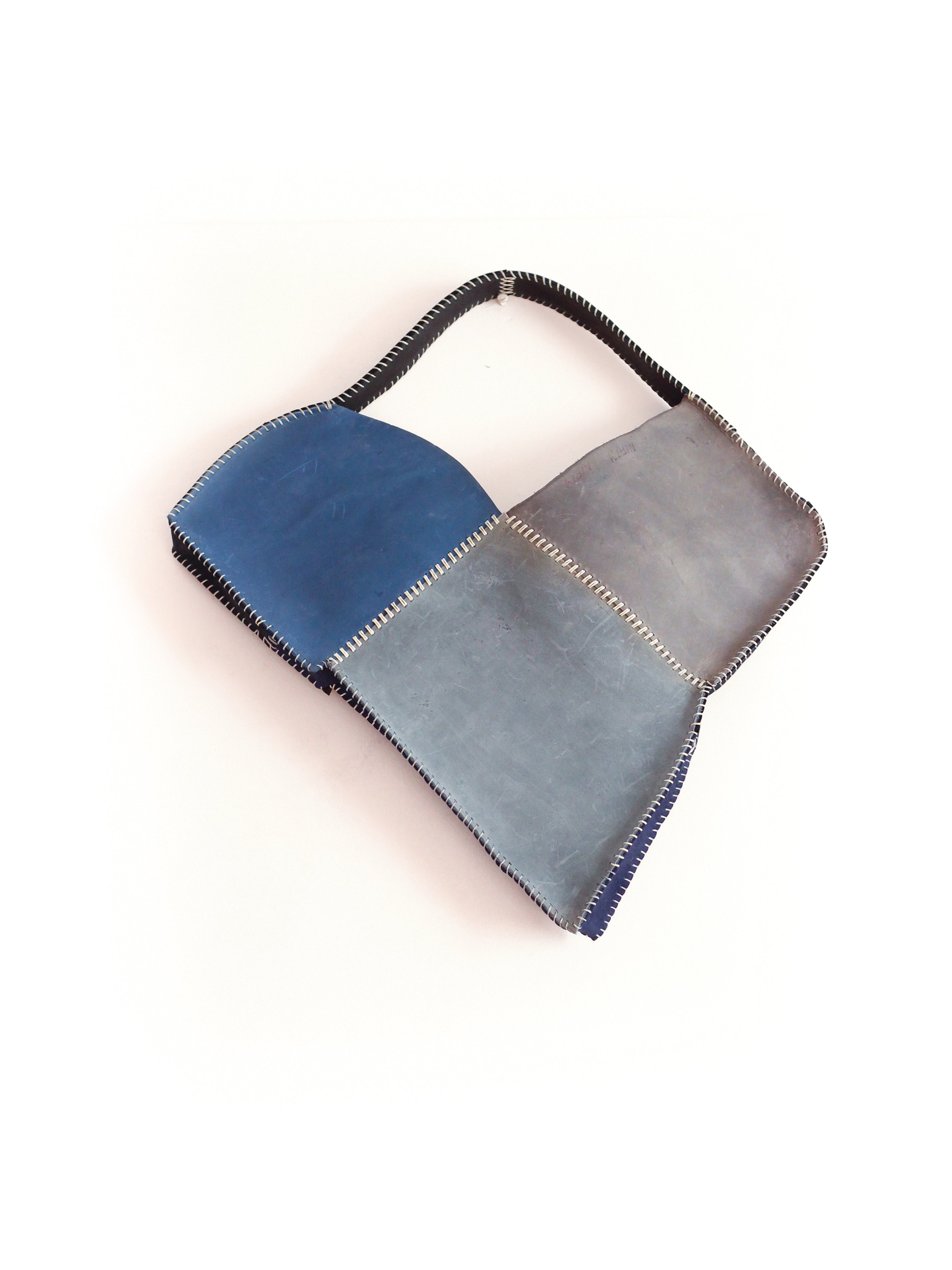 the blue broken heart leather bag